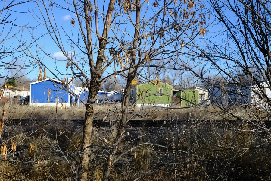 houses on other side of tracks